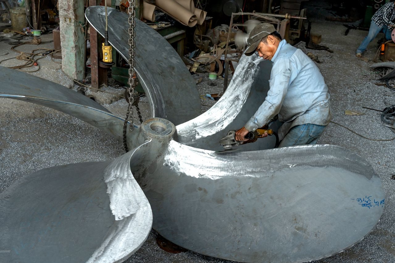 Finishing a large industrial metal part